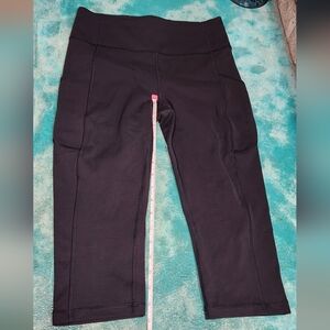 Lululemon Athletica Invigorate Crop, Black, Size 6. Well-loved.
